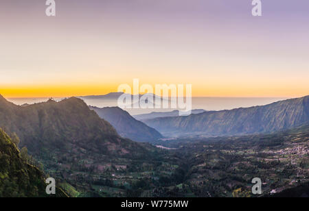 Sunrise at the Bromo Tengger Semeru National Park on the Java Island, Indonesia. View on the Bromo or Gunung Bromo on Indonesian, Semeru and other Stock Photo