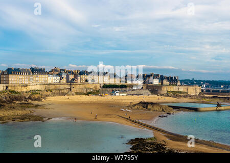 Saint Malo old town ramparts cityscape or skyline and Plage de Bon-Secours on a sunny day, Brittany, France. Stock Photo
