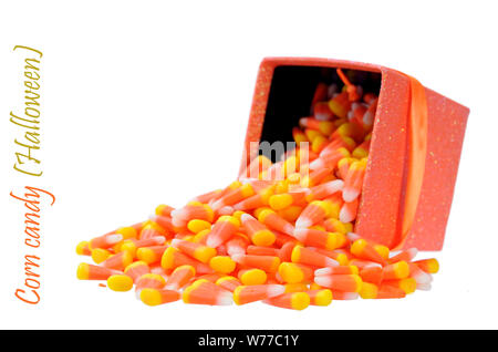 corn candy falling out busket isolated on white Stock Photo