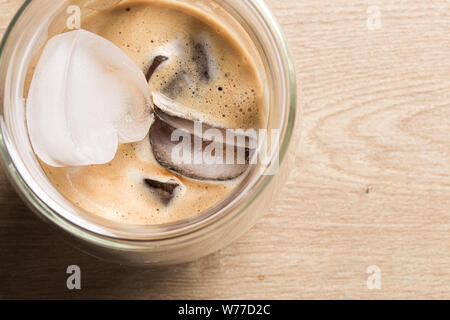 Ice coffee with heart shaped ice cubes close up Stock Photo