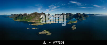 Panorama Lofoten is an archipelago in the county of Nordland, Norway. Is known for a distinctive scenery with dramatic mountains and peaks, open sea a Stock Photo