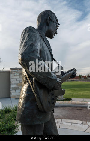 A statue of rock-'n'-roll legend Buddy Holly, the centerpiece of a walk of fame that honors other West Texas musicians in Holly's hometown of Lubbock, Texas Physical description: 1 photograph : digital, tiff file, color.  Notes: Sculptor: Grant Speed (Source: lubbockonline, 2014); Forms part of: Lyda Hill Texas Collection of Photographs in Carol M. Highsmith's America Project in the Carol M. Highsmith Archive.; Across the street is a museum devoted to Holly, born Charles Hardin Holley, was killed along with singers Richie Valens and The Big Bopper Richardson in the plane crash in 1959. The eve Stock Photo
