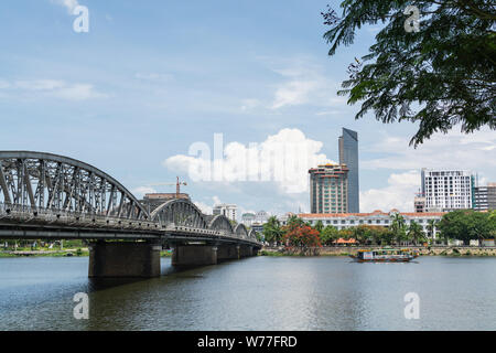 Hue, Vietnam - June 2019: panoramic view over city center and iron Trang Tien bridge over Perfume river Stock Photo