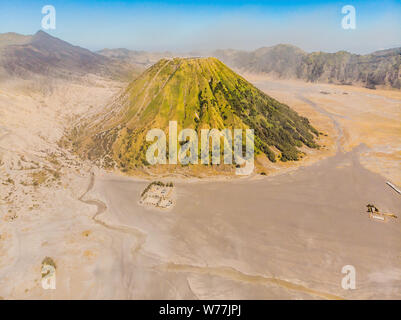 Aerial shot of the Bromo volcano and Batok volcano at the Bromo Tengger Semeru National Park on Java Island, Indonesia. One of the most famous Stock Photo