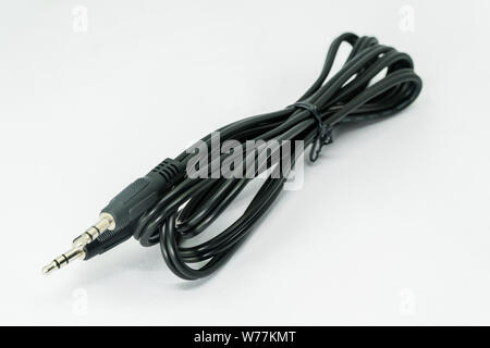 3.5mm jack plug and cable isolated on the white background Stock Photo