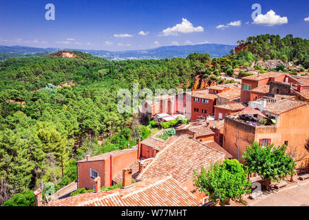 Fantastic view on ancient town Roussillon in Provence, France, one of iconic Luberon, Vaucluse landmarks. Stock Photo