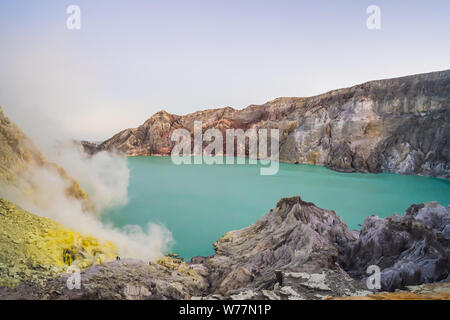The Ijen volcano or Kawah Ijen on the Indonesian language. Famous volcano containing the biggest in the world acid lake and sulfur mining spot at the Stock Photo