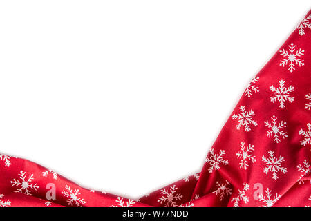 Cristmas red tablecloth with snowflakes isolated on white background - Top of view. Stock Photo