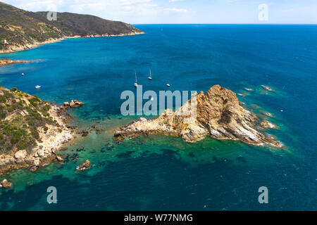 The coastline of Monte Argentario on a summers day. A stunning landscape and blue/turquoise ocean. Stock Photo