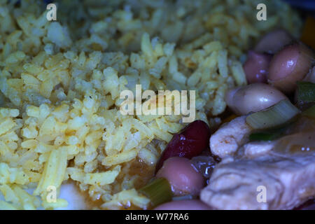 Rice with curry refined and served hot Stock Photo