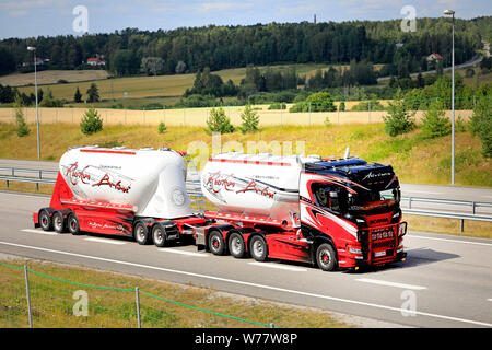 Salo, Finland. August 2, 2019. Next generation Scania R580 bulk transport truck of Kuljetus Auvinen Oy delivers load along Motorway E18 in Finland. Stock Photo