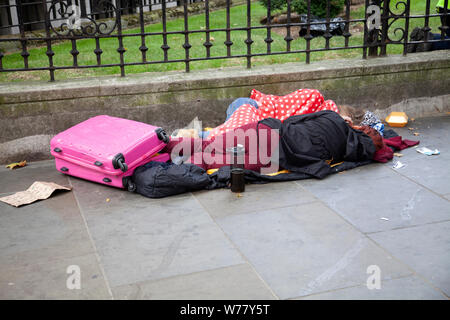 Two Young Women Sleeping Rough in London, UK Stock Photo