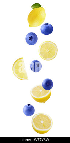 Isolated flying fruit. Falling lemon and blueberries isolated on white background with clipping path as package design element and advertising. depth Stock Photo