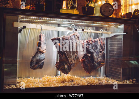Dried meat. Beef steak in the drying oven. Stock Photo