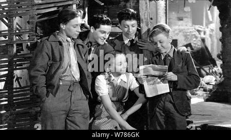 STANLEY ESCANE, JOAN DOWLING, HARRY FOWLER & DOUGLAS BARR  Character(s): Roy, Clarry, Joe Kirby, Alec  Film 'HUE AND CRY' (1947)  Directed By CHARLES CRICHTON  01 February 1947  SAY97174  Allstar Picture Library/EALING STUDIOS  **WARNING**This Photograph is for editorial use only and is the copyright of EALING STUDIOS  and/or the Photographer assigned by the Film or Production Company & can only be reproduced by publications in conjunction with the promotion of the above Film. A Mandatory Credit To EALING STUDIOS is required. The Photographer should also be credited when known. No commercial u Stock Photo