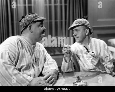OLIVER HARDY, STAN LAUREL, THE BIG NOISE, 1944 Stock Photo
