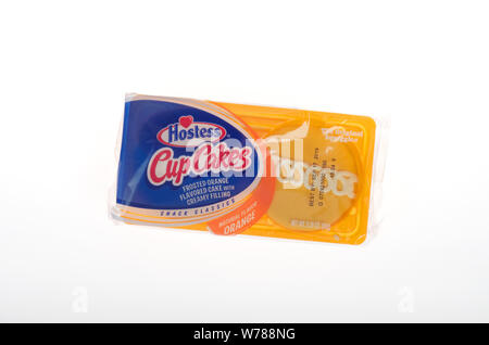 Hostess frosted orange cupcakes in package Stock Photo