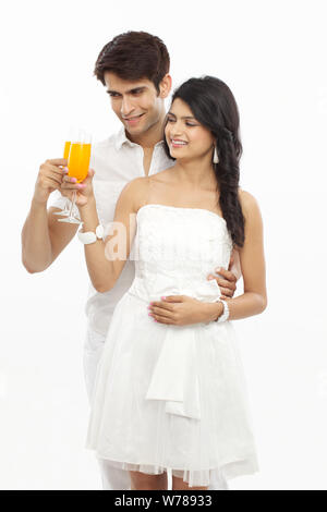 Young couple drinking juice Stock Photo