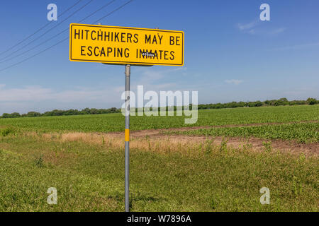 Hitchhikers may be escaping inmates sign. Between Hondo and Sabinal ...