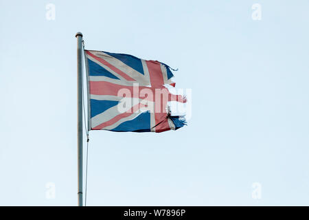 Torn or ripped Union Jack flag, UK Stock Photo