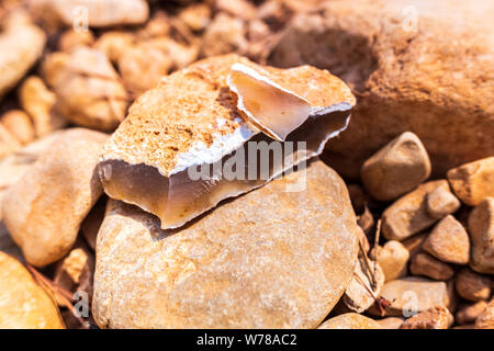 Piece of a flint stone, silex, used in prehistory as a tool. Stock Photo