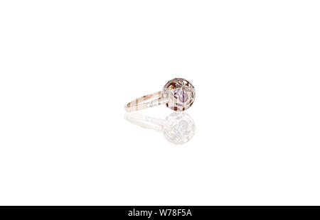 Yello gold precious ball with colored stones ring female with diamonds on white isolated background. Good material for design jewelery. Stock Photo