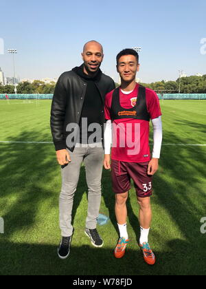 French football player Thierry Henry and his wife Nicole attend