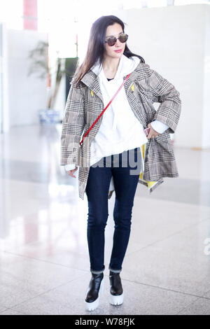 Chinese actress Li Bingbing is pictured at the Beijing Capital International Airport in Beijing, China, 4 November 2017. Stock Photo