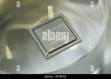 A new-generation Artificial Intelligence (AI) chip of Chinese semiconductor company Cambricon is on display at the 19th China International Industry F Stock Photo