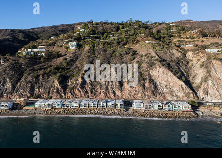 Aerial of shoreline and hillside homes near Los Angeles and Santa Monica on Highway 1 in Malibu, California. Stock Photo