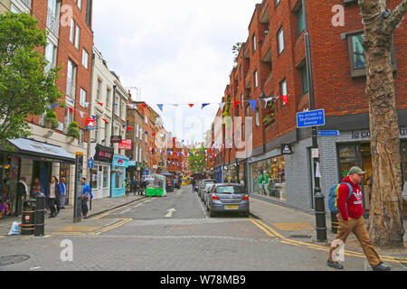 London, Great Britain -May 25, 2016: cafes and shops on the Earlham Street Stock Photo