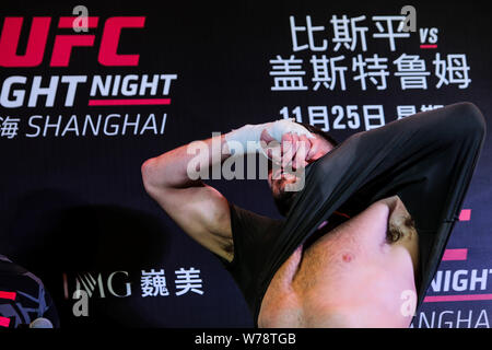 British mixed martial artist and actor Michael Bisping receives an interview during his open workout ahead of the 2017 UFC Fight Night Shanghai at the Stock Photo