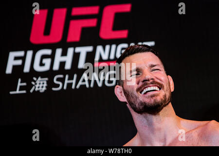 British mixed martial artist and actor Michael Bisping receives an interview during his open workout ahead of the 2017 UFC Fight Night Shanghai at the Stock Photo