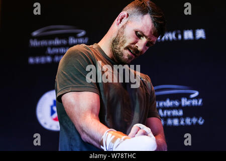 British mixed martial artist and actor Michael Bisping receives an interview during his open workout ahead of the 2017 UFC Fight Night Shanghai at the Stock Photo