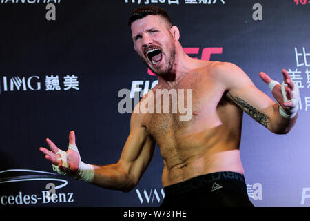 British mixed martial artist and actor Michael Bisping receives an interview during his open workout ahead of the 2017 UFC Fight Night Shanghai at the Stock Photo