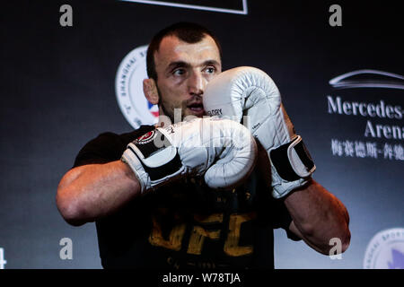 Russian heavyweight Sanshou kickboxer and mixed martial artist Muslim Salikhov receives an interview during his open workout ahead of the 2017 UFC Fig Stock Photo