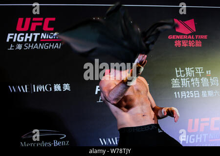 British mixed martial artist and actor Michael Bisping receives an interview during his open workout ahead of the 2017 UFC Fight Night Shanghai at the Stock Photo