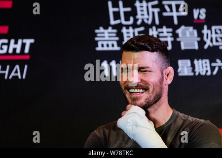 British mixed martial artist and actor Michael Bisping receives an interview during his open workout ahead of the 2017 UFC Fight Night Shanghai at the Stock Photo