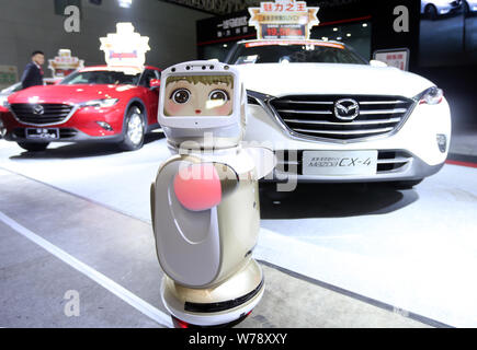 An intelligent robot is on display during the Xinjiang Autumn Auto Expo 2017 at the Xinjiang International Exhibition Center in Urumchi, northwest Chi Stock Photo