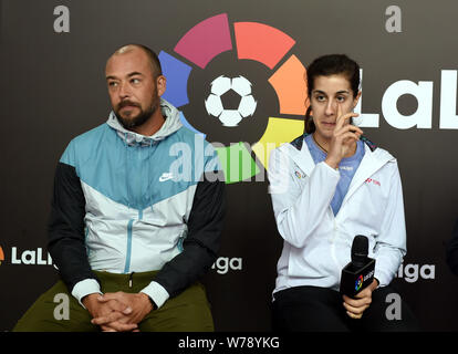Spanish badminton champion Carolina Marin, right, and Spanish retired footballl player Roberto Losada attend an event to promote La Liga, the Spanish Stock Photo