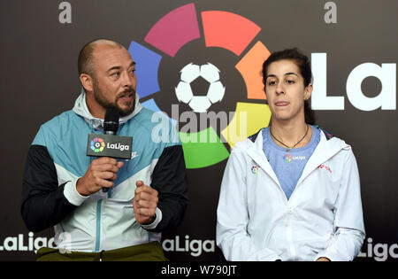 Spanish badminton champion Carolina Marin, right, and Spanish retired footballl player Roberto Losada attend an event to promote La Liga, the Spanish Stock Photo