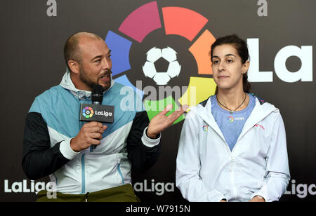 Spanish badminton champion Carolina Marin, right, and Spanish retired footballl player Roberto Losada attend an event to promote La Liga, the Spanish Stock Photo