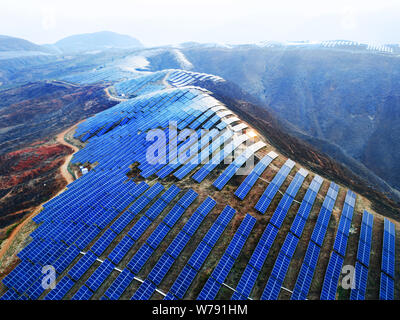 Panda Pv Array --FILE--Solar panels are installed at a photovoltaic (PV) power plant ...