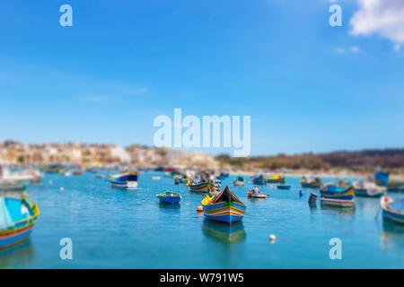 Marsaxlokk is a small, traditional fishing village in the South Eastern Region of Malta. It has a harbour, and is a tourist attraction known for its v Stock Photo