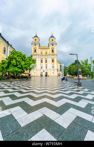 MONDSEE, AUSTRIA - JULY 13, 2019: The Collegiate Church of St Michael in Mondsee town in Upper Austria. Stock Photo