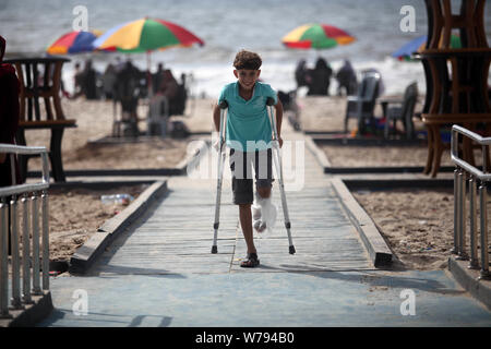 Gaza City, Gaza Strip, Palestinian Territory. 5th Aug, 2019. Palestinians with disabilities enjoy the beach at a cafe on the shores of the Mediterranean sea in Gaza city, on August 05, 2019. Gaza Municipality opened the first accessible beach for disabled individuals, old people and injured people Credit: Mahmoud Ajjour/APA Images/ZUMA Wire/Alamy Live News Stock Photo