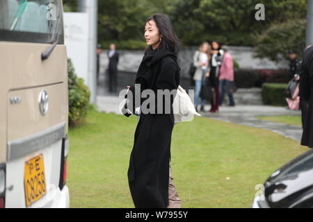 Victoria's Secret Angel and Chinese model Ju Xiaowen is pictured as she leaves the hotel for a rehearsal of the 2017 Victoria's Secret Fashion Show in Stock Photo