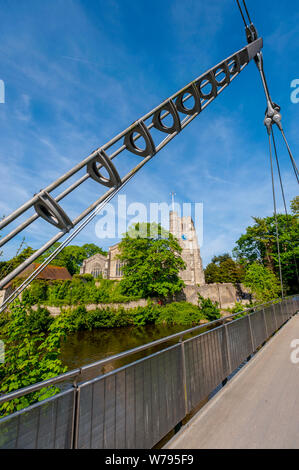 All Saints Church, Maidstone on the banks of the Meday on a sunny spring day. From Lockmeadow Footbridge Stock Photo