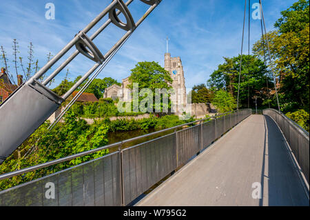 All Saints Church, Maidstone on the banks of the Meday on a sunny spring day. From Lockmeadow Footbridge Stock Photo