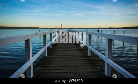 footbridge at lake Plauer See idyllic landscape Stock Photo